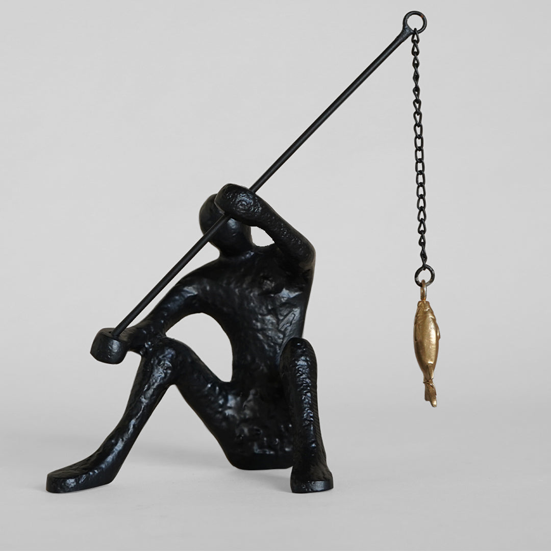 Dux Fishing Man Sculpture